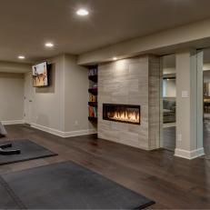 Basement Workout Room Separated by Glass Wall