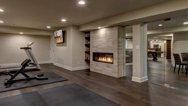 Basement Workout Room Separated by Glass Wall HGTV