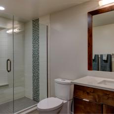Modern Basement Bathroom with Warm, Wood Accents