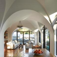 Family Room with Arches that Open Up the Space