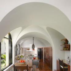 Arches Allow for a Clear View of This Historic Home's First Floor