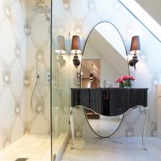 Chic Vanity With Oval Mirror Next to Walk-in Shower
