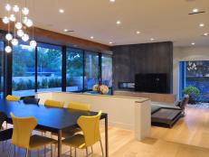 Dining and Living Space with Floor to Ceiling Wall of Sliding Glass