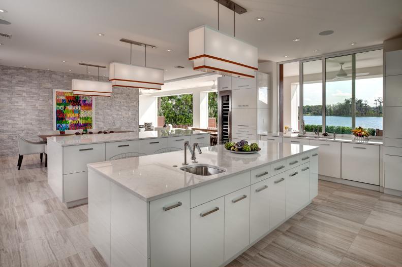White Contemporary Kitchen With White Cabinets & Twin Islands