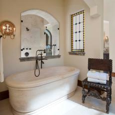 Timeless Stone Bathtub in Spanish Master Bathroom