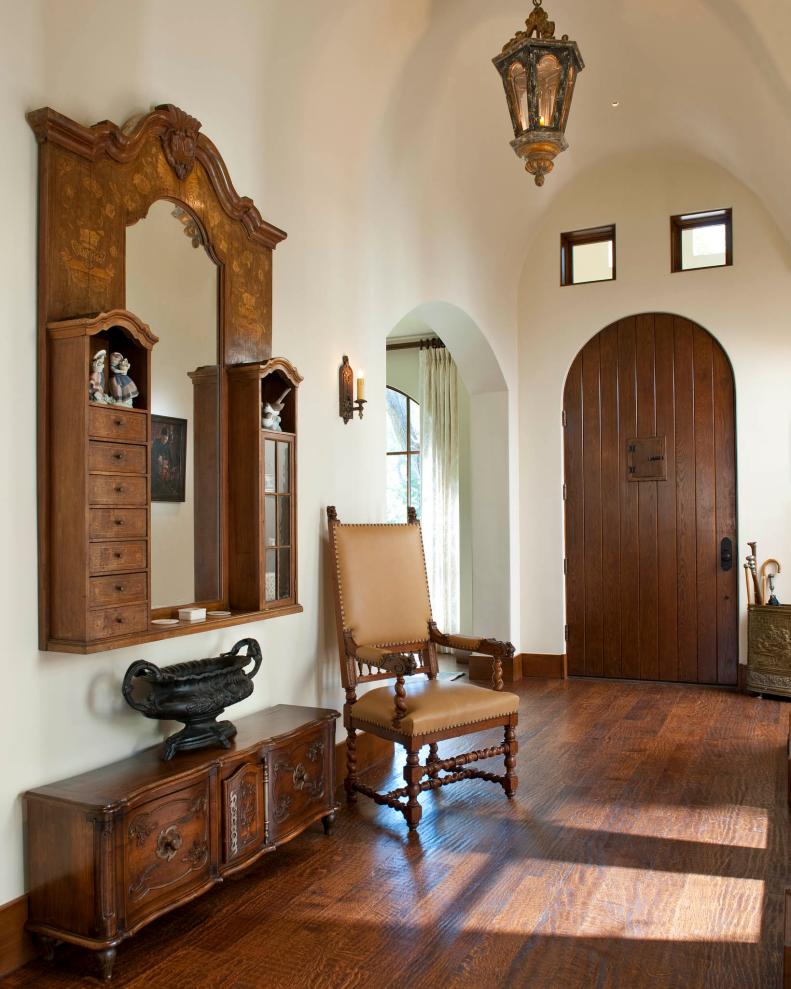 Spanish-Inspired Foyer With Arched Front Door