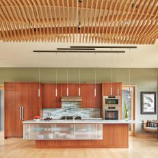 Open Plan Kitchen With Light & Medium Wood Tones