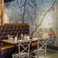 Large Wall Map Provides Focal Point and Conversation Piece to the Space
