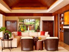 Living Room With Warm Wood Tray Ceiling