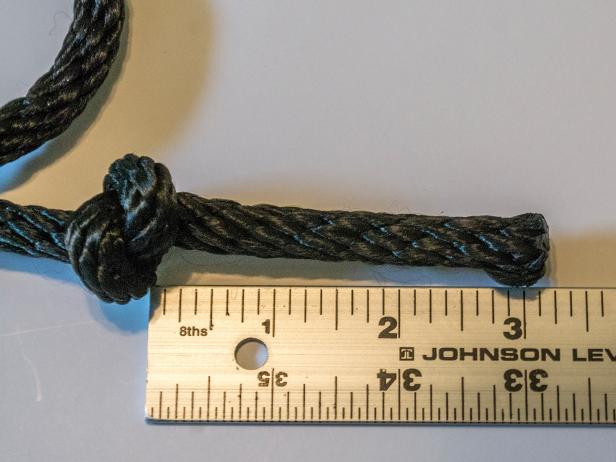 Tie a large knot at one end of the 16’ rope, leaving about 3” of a tail. Melt the end of the rope slightly to prevent fraying.