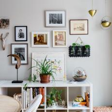 Eclectic Gallery Wall and Book Case in Paris Café Inspired Dining Room