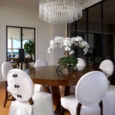Dining Room With Orchid Centerpiece