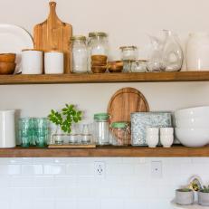 Natural Wood Shelves in White Farmhouse Kitchen