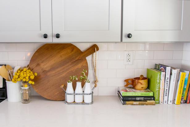 Farmhouse Kitchen with Colorful Recipe Books and Wooden Accents 