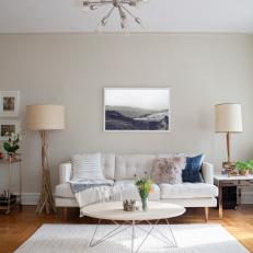 Contemporary Living Room With Eclectic Light Fixture