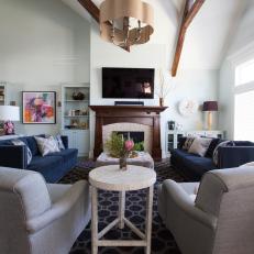 Family Room With Fireplace and Wood Beam Ceiling