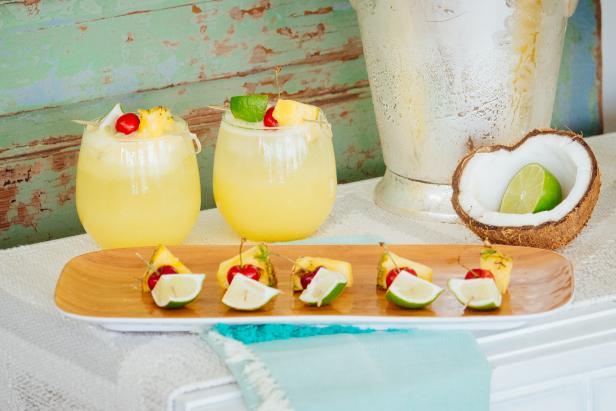 Pineapple, Coconut and Lime Cocktail Displayed With Garnishes