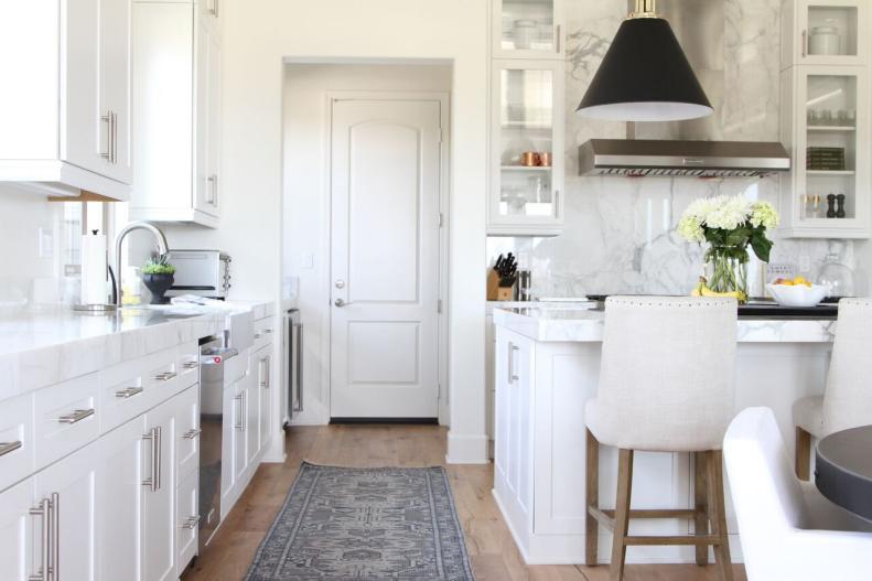 White Kitchen With Gray Rug