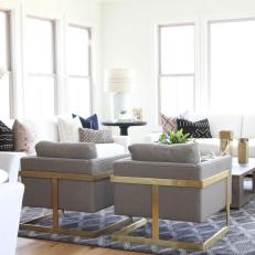 White Contemporary Living Room With Gray Armchairs