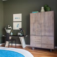 Untreated Wood Wardrobe in Contemporary Bedroom With Deep Sea Green Walls and Black and White Desk Space 