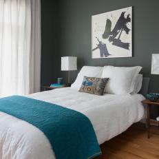 Deep Sea Green Bedroom With Contemporary Furniture, Abstract Wall Art and White Linens 