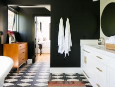 Black Spa Bathroom With White Towels