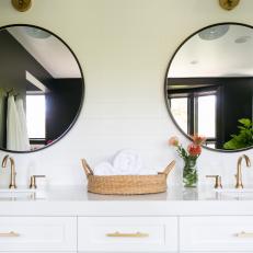 Twin Round Bathroom Mirrors and White Vanity