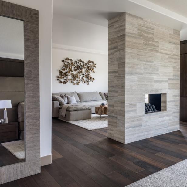Chic Open Living Room With Double Sided Fireplace Hgtv