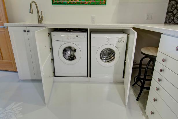 Cabinet Concealed Front Load Washer And Dryer Under Light Gray