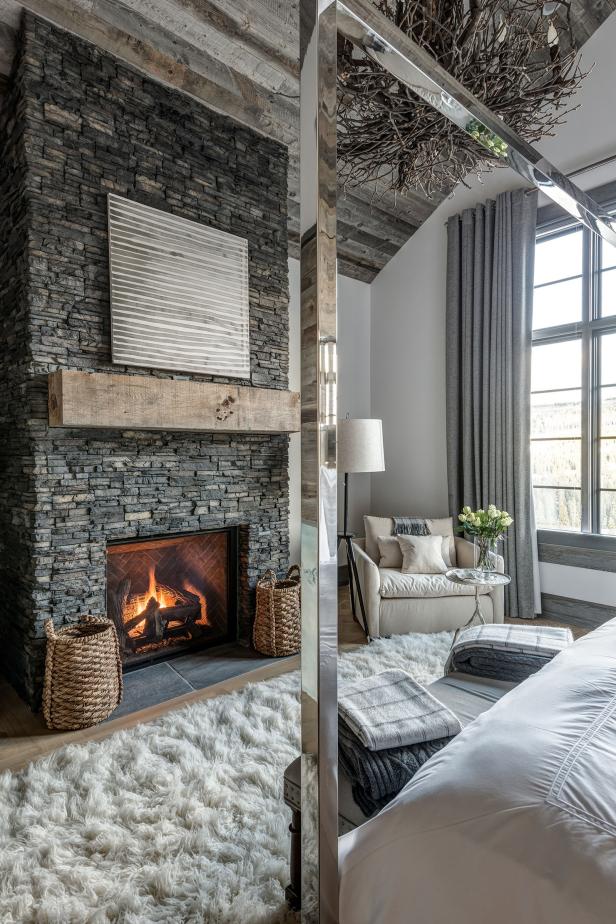 Rustic, Contemporary Master Bedroom With Stacked Stone Fireplace