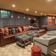Blue and Red Game Room With Leather Sectional