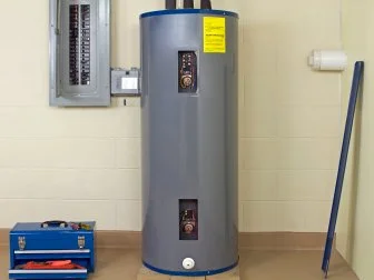 Residential Water Heater with the panel removed for repairs or adjustments to the thermostat. Please also see my lightbox: