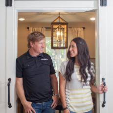 Joanna and Chip Gaines at the Sliding Door Entry of a New Office
