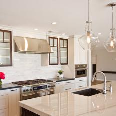 Contemporary Kitchen With Glass Pendant Lights