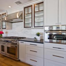 Contemporary Kitchen With Glass Cabinets