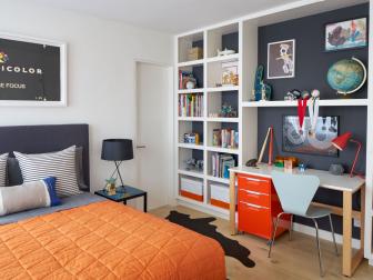 White Contemporary Teen Bedroom With Wall of Built-In Bookshelves