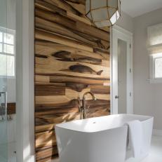 Modern Bathroom With Wood Accent Wall and Hexagon Chandelier