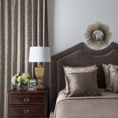 Taupe Transitional Bedroom With Metal Starburst Mirror