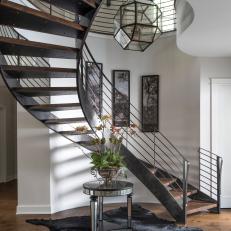 Contemporary Foyer With Metal Spiral Staircase  