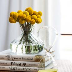 Books and Vases on Wooden Coffee Table
