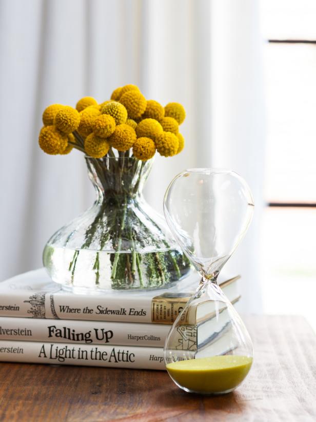 Books and Vases on Wooden Coffee Table