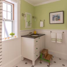 Green Cottage Bathroom With Black-and-White Tile Floor