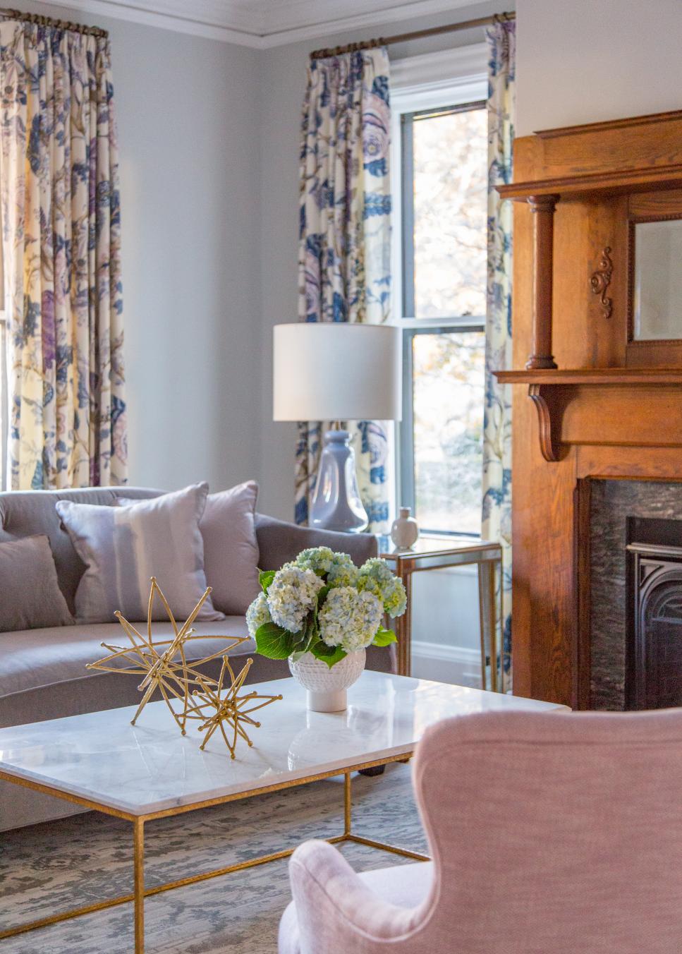 Blue Sitting Room With Fireplace and Floral Curtains HGTV