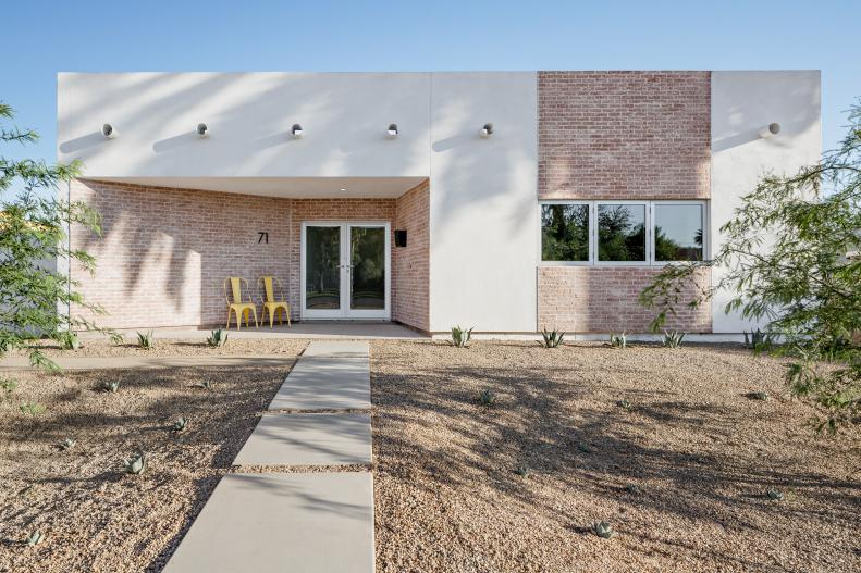 Southwestern Home With Red Brick and White Stucco Exterior