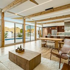 Modern Open Concept Living Room With Exposed Beam Ceilings