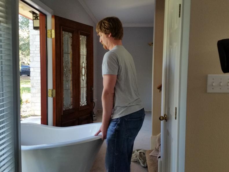 Bathroom seen by Caitlin and Cory while touring a home as seen on HGTV's House Hunters Renovation. (before, interior)