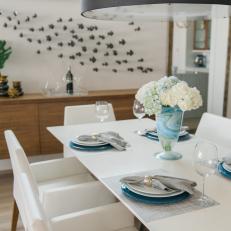 White Dining Table With Blue Vase