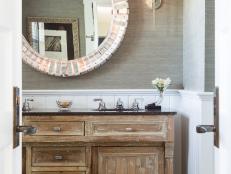 Powder Room with Rustic Wood Vanity and Large Circular Mirror