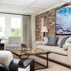 Reclaimed Brick Wall Adds Interest to Farmhouse Living Room