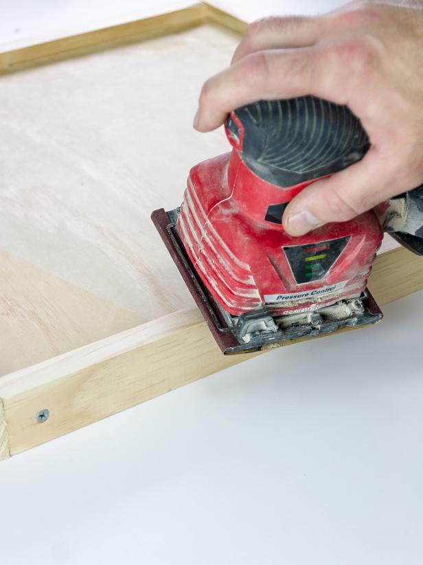 Repeat the process for the bottom tray beginning with the 16-7/8â   trim and finishing with the 18-Â¼â   trim. When the putty has dried, sand the trays. Pay special attention to the corners, taking away any sharp edges for safety.